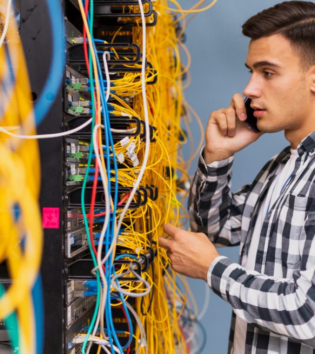 young-network-engineer-talking-phone